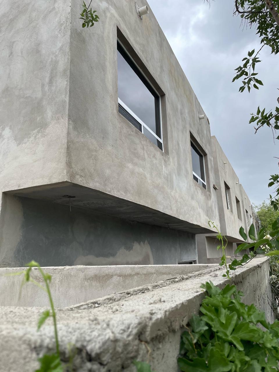 Row of townhouses with aluminum windows by FerMac