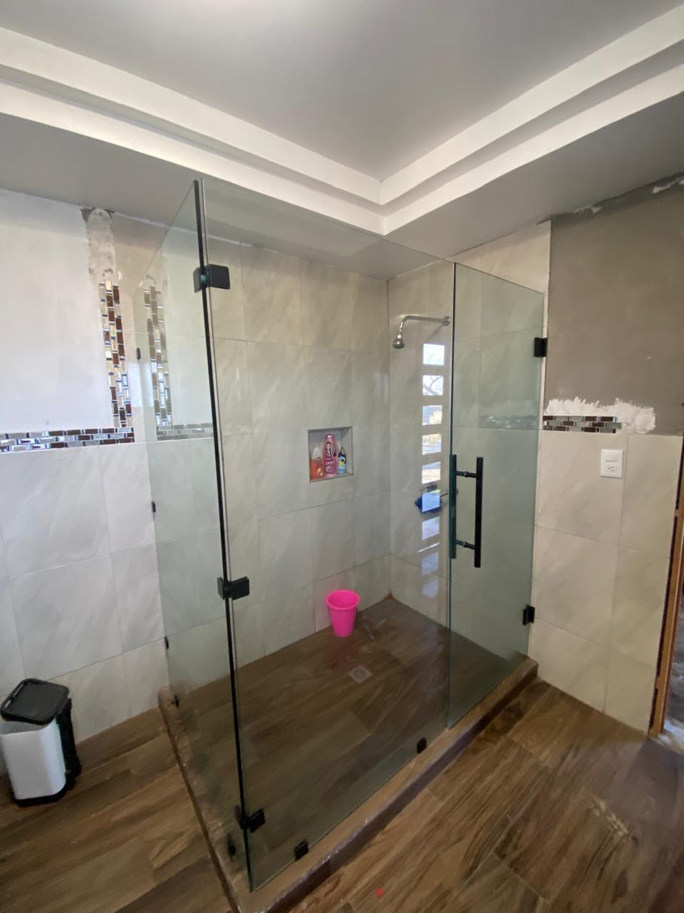 Glass shower enclosure installed by FerMac — 2