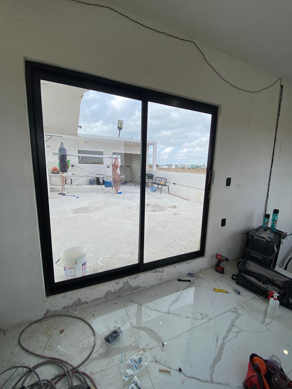 Aluminum sliding patio door with screen by FerMac — 2