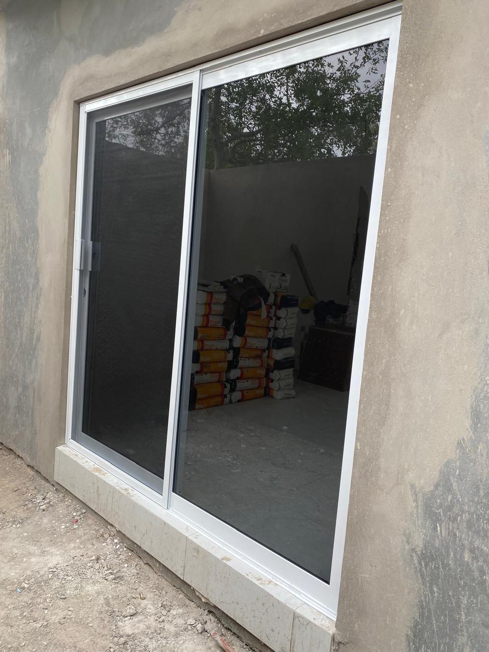 Aluminum sliding patio door with screen by FerMac
