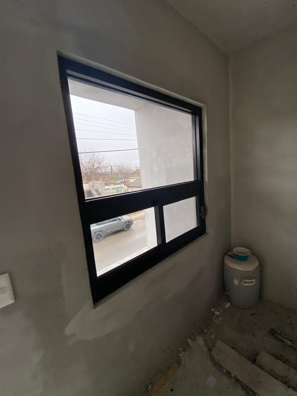 Aluminum window installation on a commercial project by FerMac
