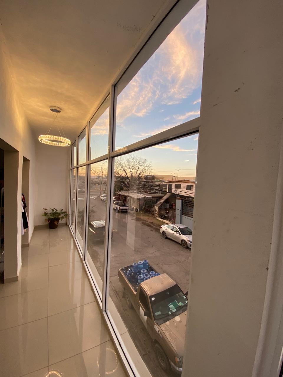 Floor-to-ceiling glass curtain wall corridor fabricated by FerMac
